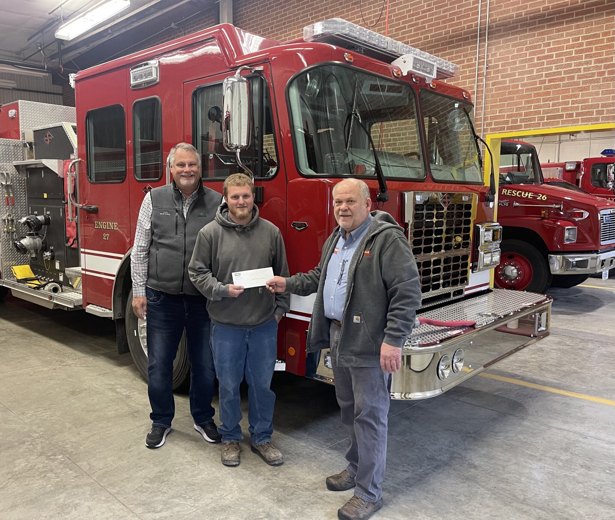 NEW Cooperative Donates to Britt Fire Association NEW Cooperative Inc.